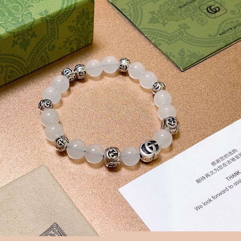 G*u*i bracelets